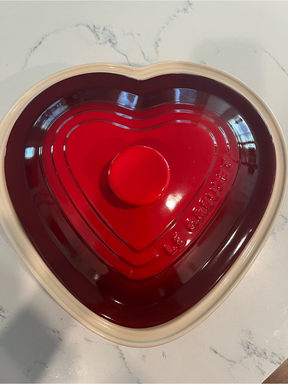 Le Creuset Heart-Shaped Stoneware Dish in Red with Cream Rim